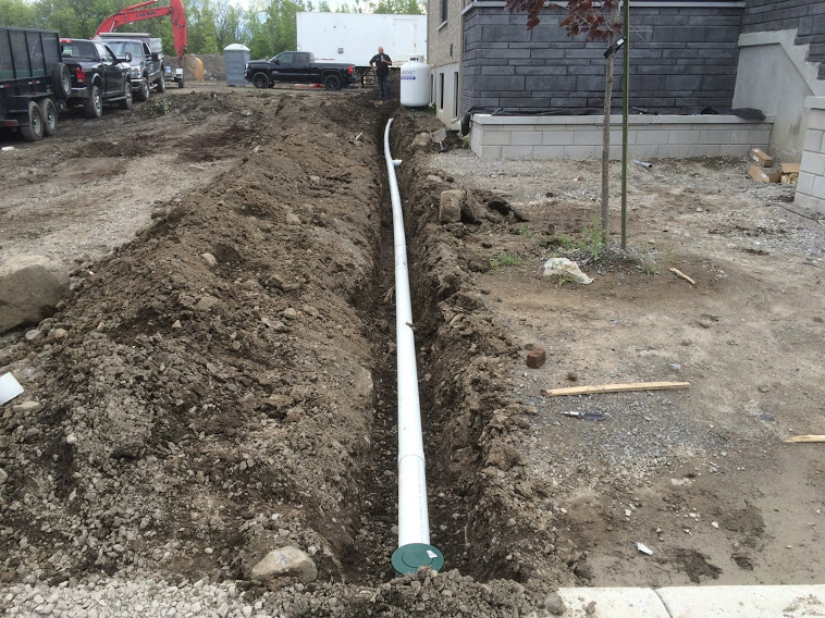 Installation de système de drainage rive-nord